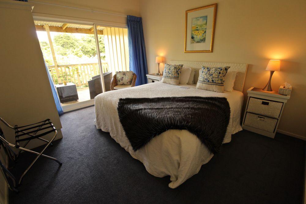 Schlafzimmerbeispiel, Waipoua Lodge, Aranga, Neuseeland Reise