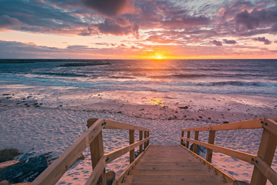 Sonnenuntergang am Strand, Adelaide, Australien Mietwagenreise